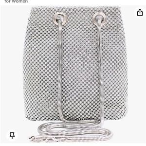 Small rhinestone bag. Like new. No missing rhinestones. Silver.
